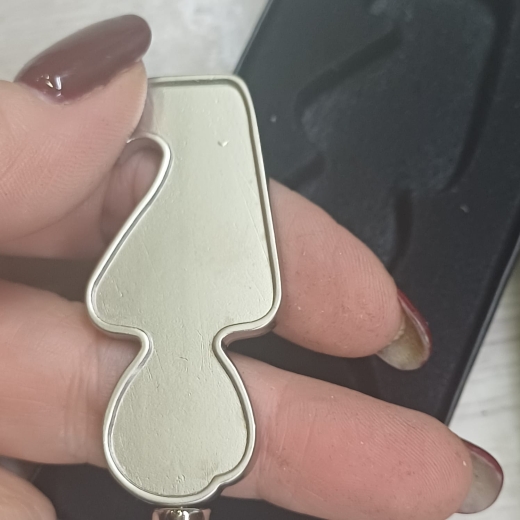 Изображение №3 | Брелок-открывалка «Human» (серебристый)